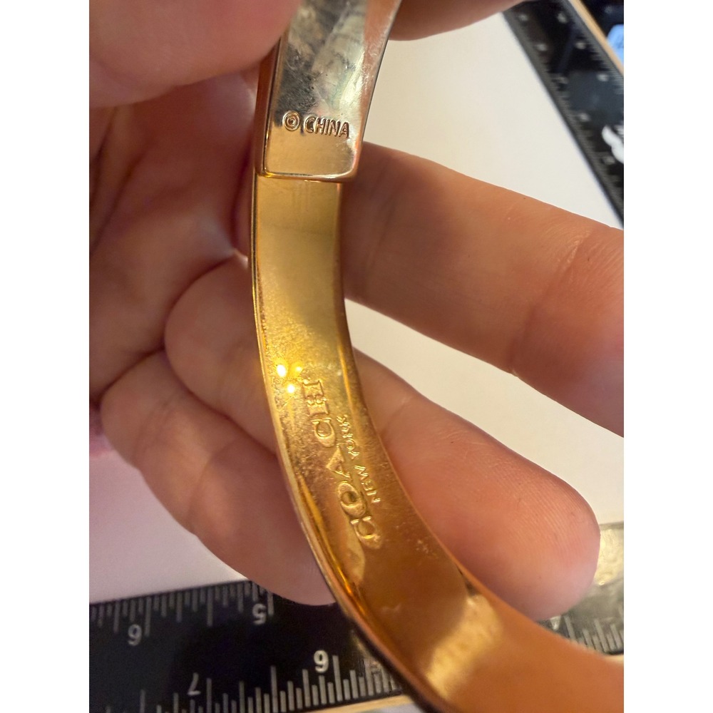 Coach Gold Tone Hinged Bypass Bangle Bracelet Logo Embossed Cuff - Picture 2 of 3
